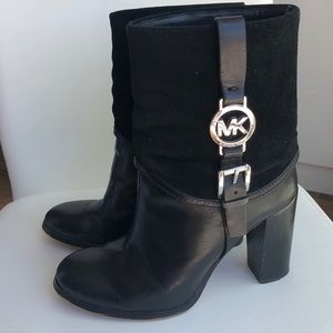 Black leather and suede above ankle boots.
